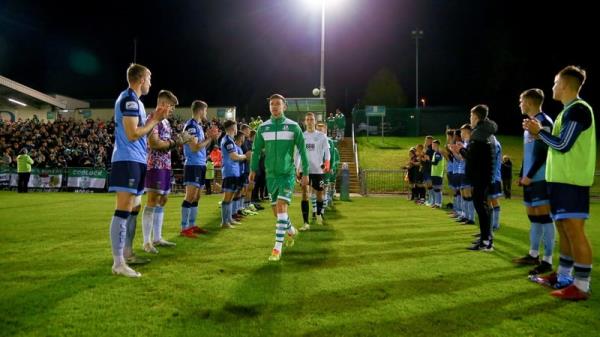 UCD players form a guard of ho<em></em>nour for Shamrock Rovers before the match